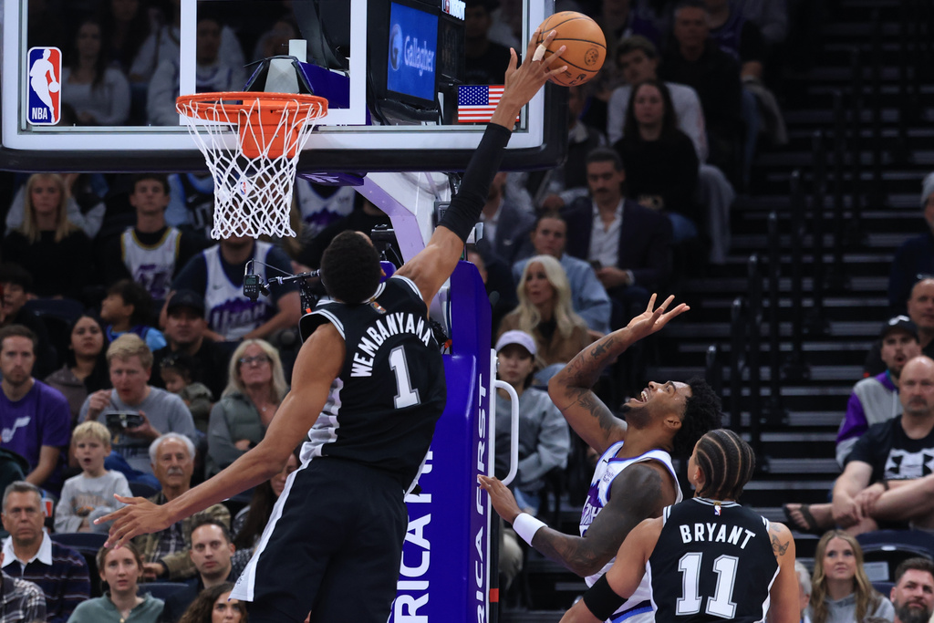 Wembanyama scores 36 points and the Spurs clamp down in overtime to beat the Jazz 117-111